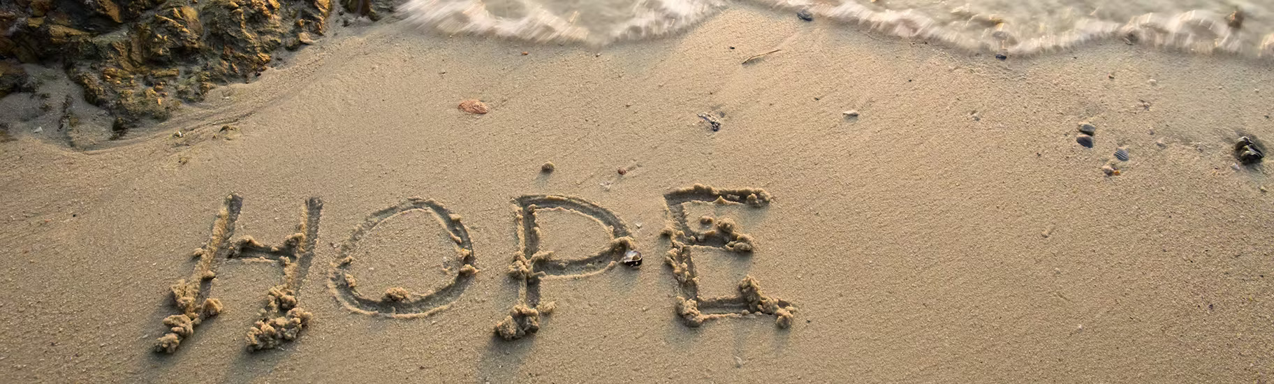 Hope written in sand